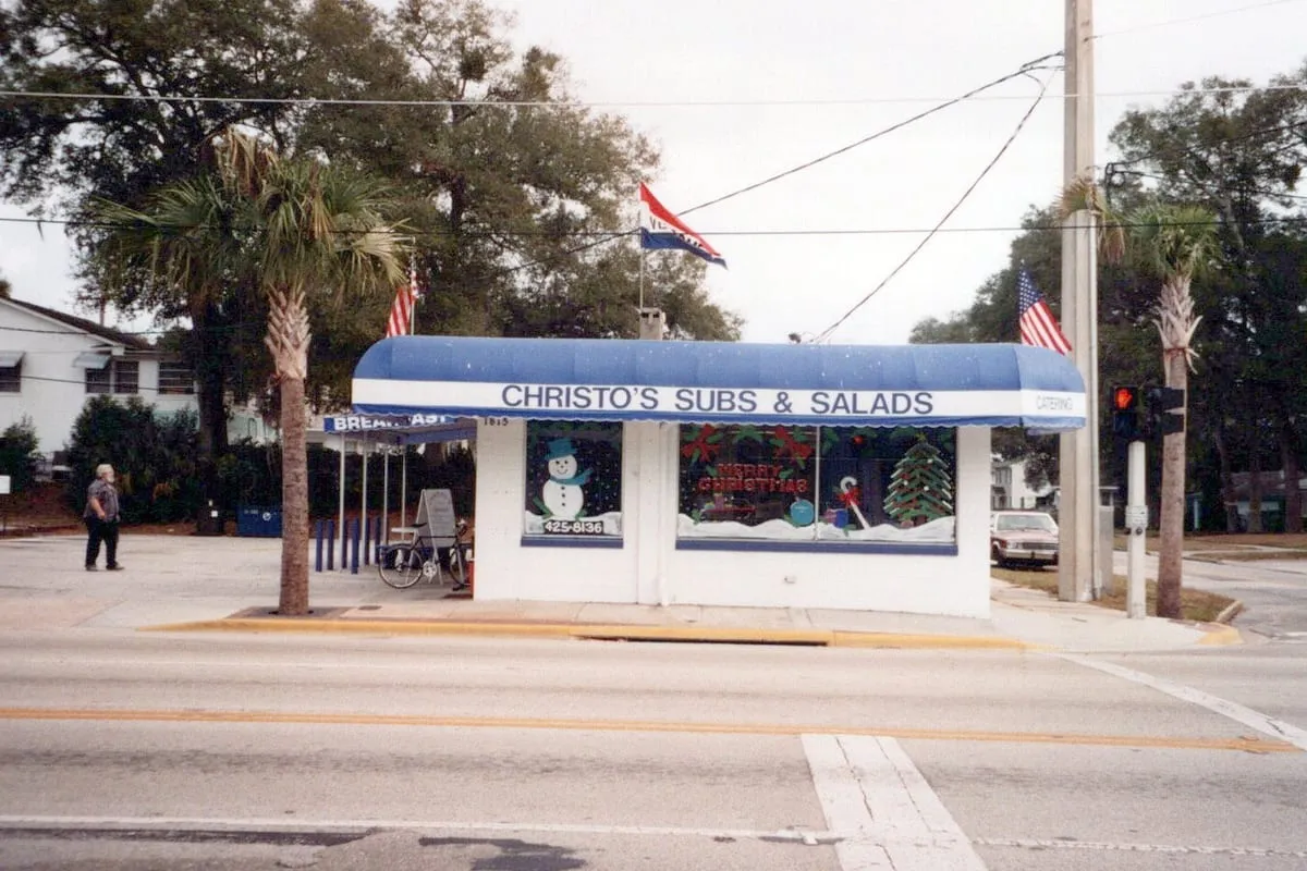 Christo's Subs & Salads under its blue awning on Edgewater Drive in College Park