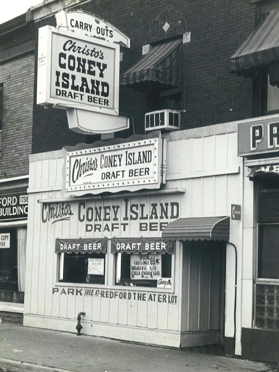 Christo's Coney Island in Detroit: the hanging Carry Outs sign, draft beer painted on the siding, footlong specials in the window