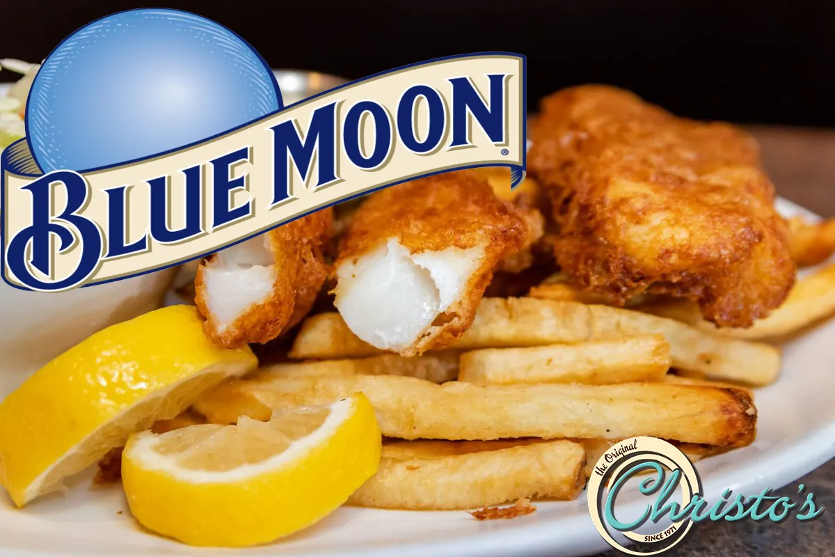 Blue Moon beer battered fish and chips with fries and lemon wedges