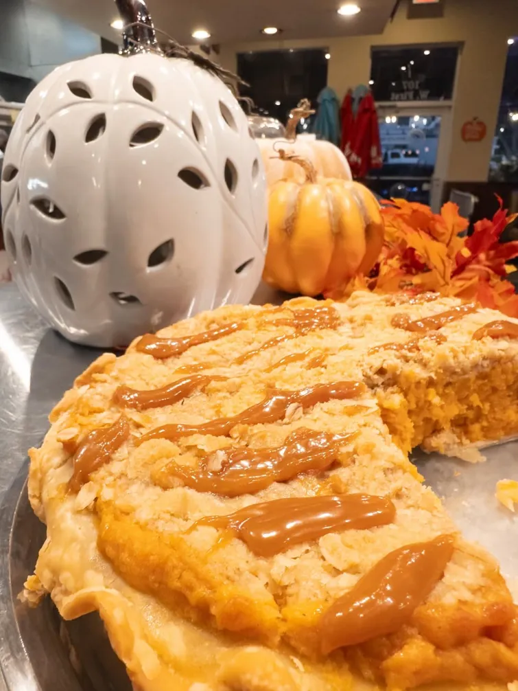 A caramel drizzled pumpkin cake