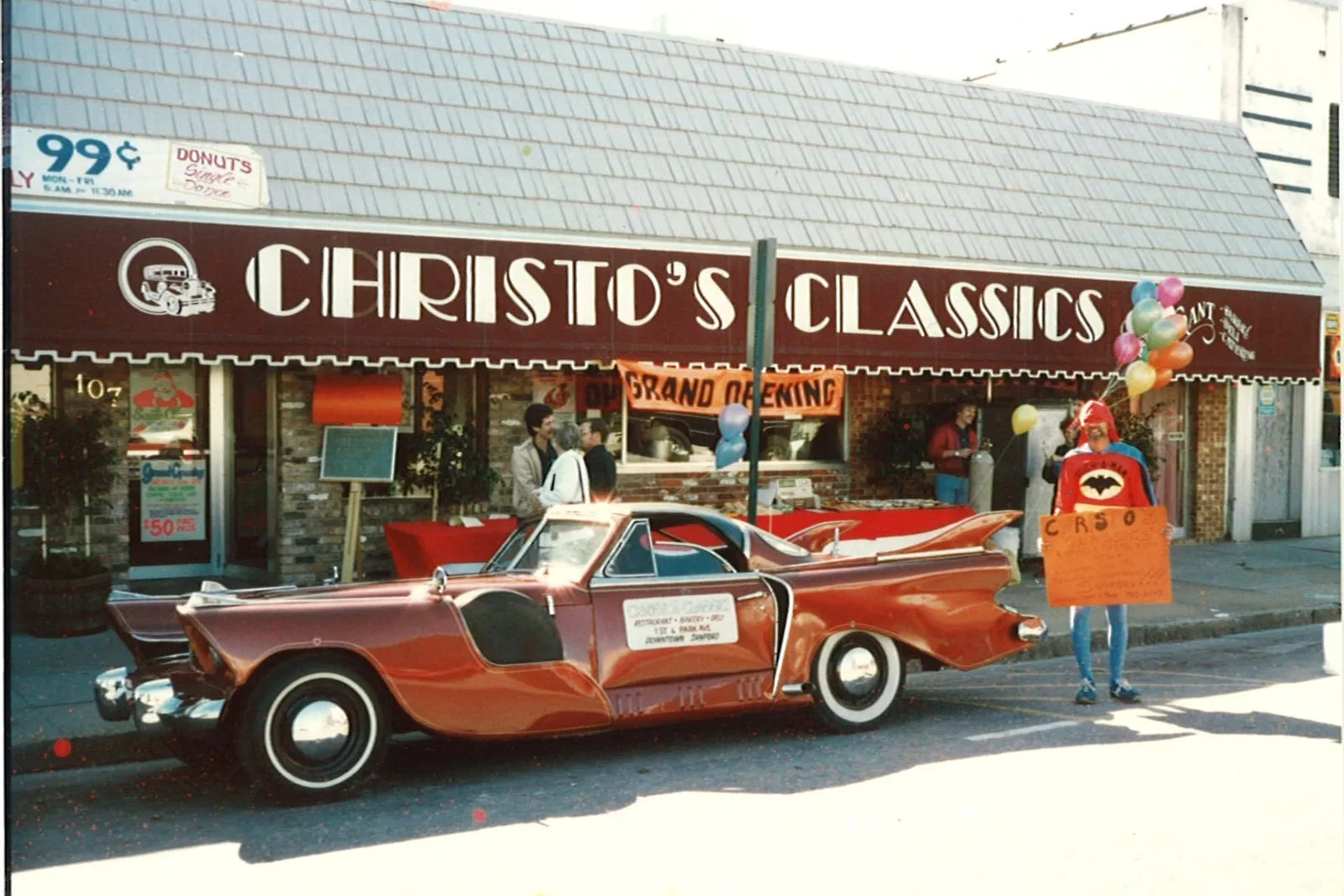Christo's Classics on First Street in Sanford at its grand opening, a classic car parked out front